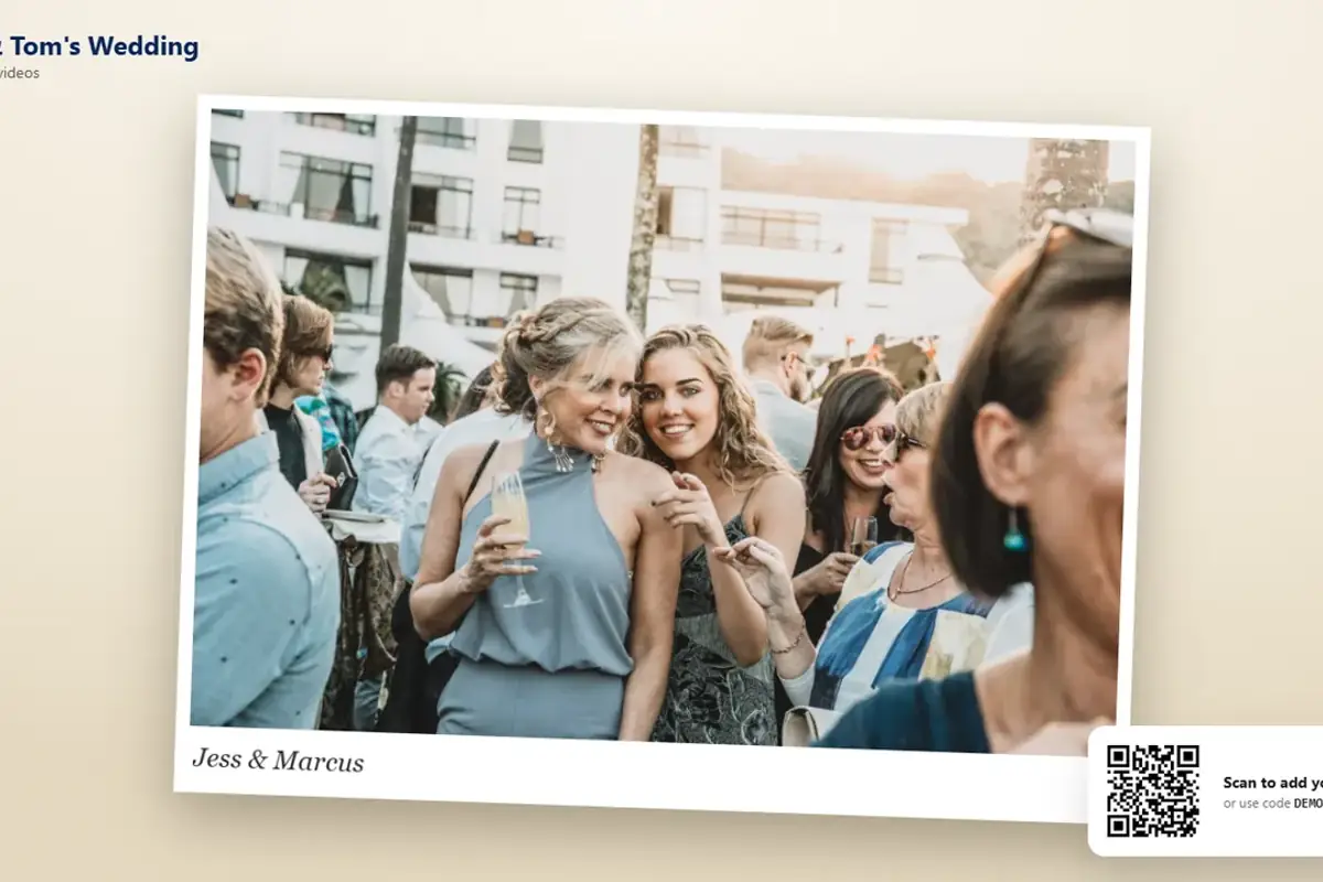 The DropSnaps TV slideshow in the Polaroid look, with the QR code in the corner